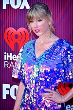 Taylor Swift made the top 10 three times in 2017, notably with "Look What You Made Me Do", which became her first UK number-one single. Taylor Swift 2 - 2019 by Glenn Francis.jpg