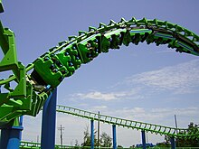 One of The Jester's trains going through a corkscrew The Jester - Six Flags New Orleans.jpg