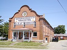 Northern Wisconsin Co-op Tobacco Pool Warehouse represents the first tobacco-grower co-operative in the nation. Tobacco building.jpg