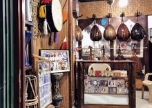 Instruments used in local music at Souq Waqif, including the oud on the right Traditional instruments used in Arabic music on display in Souq Waqif.png