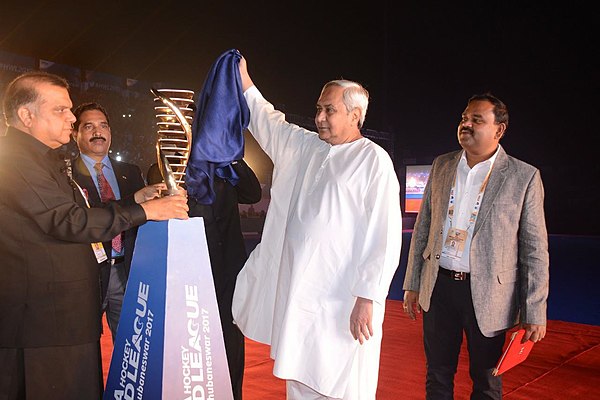 Odisha's Chief Minister Naveen Patnaik Unveiling the Trophy