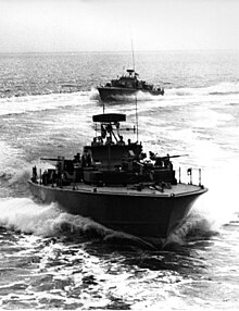 Two Nasty-class boats conduct high-speed trials in May 1963 U.S. Navy PTF boats traveling at high speed during trials off the Virginia Capes (USA), early May 1963 (USN 711288).jpg