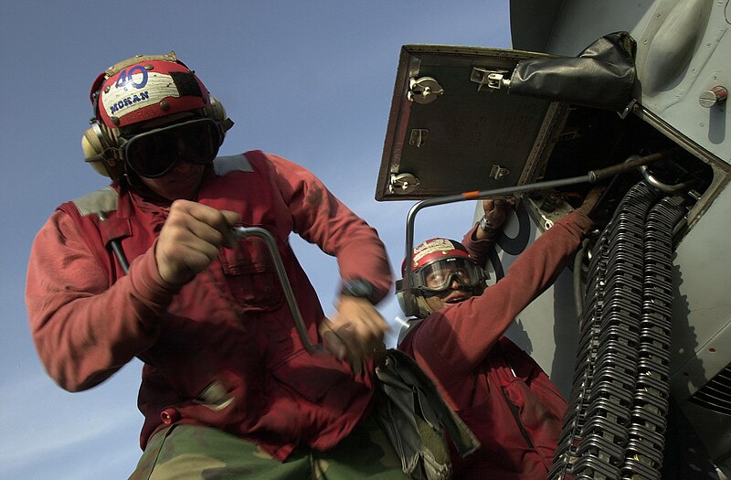 File:US Navy 020302-N-2383B-514 Ordnancemen load ammunition into F-A-18.jpg