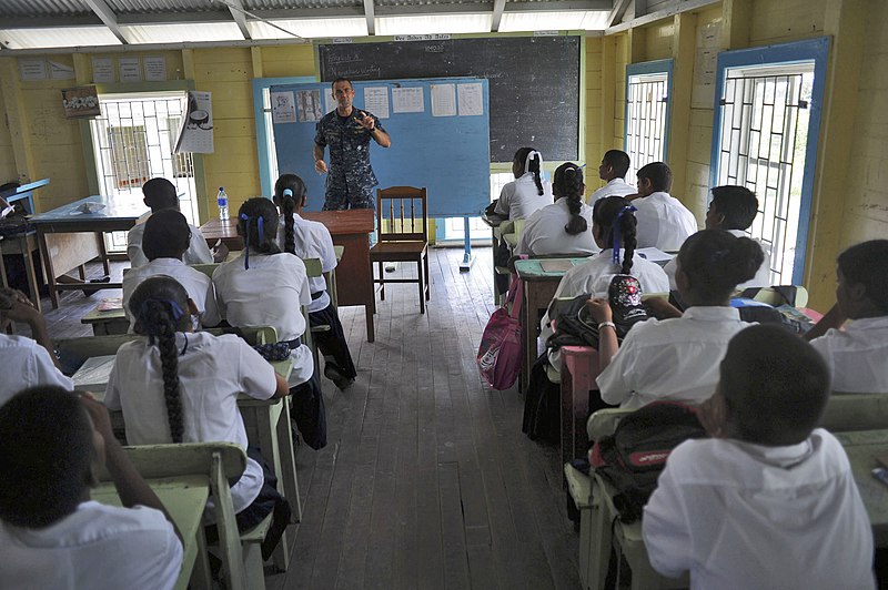 File:US Navy 101021-N-9964S-149 Lt. Mike Kavanaugh speaks to school children about mosquitoes that carry infectious disease in Guyana during a continuin.jpg