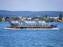 RA66 Helio is a solar-powered 20 m catamaran cruising on the Untersee, a part of Lake Constance. It is based in Radolfzell, Germany. Untersee-RA66 Helio.jpg