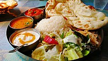 Uttar Pradeshi thali with naan, sultani dal, raita, and shahi paneer Vegetarian Curry.jpeg