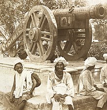 (Kim's Gun as seen in 1903) He sat in defiance of municipal orders, astride the gun Zam-Zammeh, on her old platform, opposite the old Ajaibgher, the Wonder House, as the natives called the Lahore Museum.-Kim