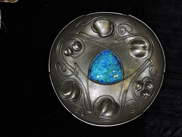 "Bollelin" series pewter plate designed by Archibald Knox, 1899