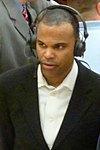 Amaker just after clinching Harvard‍‍ '​‍s first Ivy League title with the 2010–11 Harvard Crimson