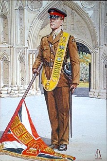 6 Royal Anglian Officer with the Bn colours at the Abbey Gate from a painting by & with the permission of Alix Baker, 1996. 6 Royal Anglian Officer at Bury Cathedral by Alix Baker.jpg