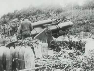 File:9.2inchhowitzerfiringWWI.ogv