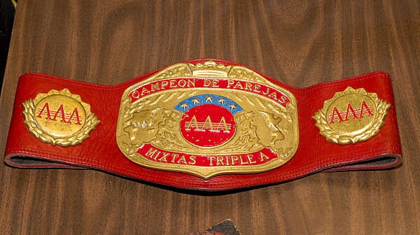 One of the two belts for the AAA World Mixed Tag Team Championship