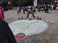 A Rangoli created as a part of protests against anti Citizenship Act 2019 at Chandmari, Guwahati, Assam Anti CAA Art demonstration.jpg