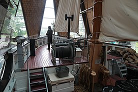 Captain Henry A. Larsen on the foredeck of the R.C.M.P. St. Rock