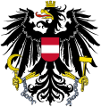 Ein Adler als Schildhalter im Wappen der Republik Österreich (siehe auch Brustschild)