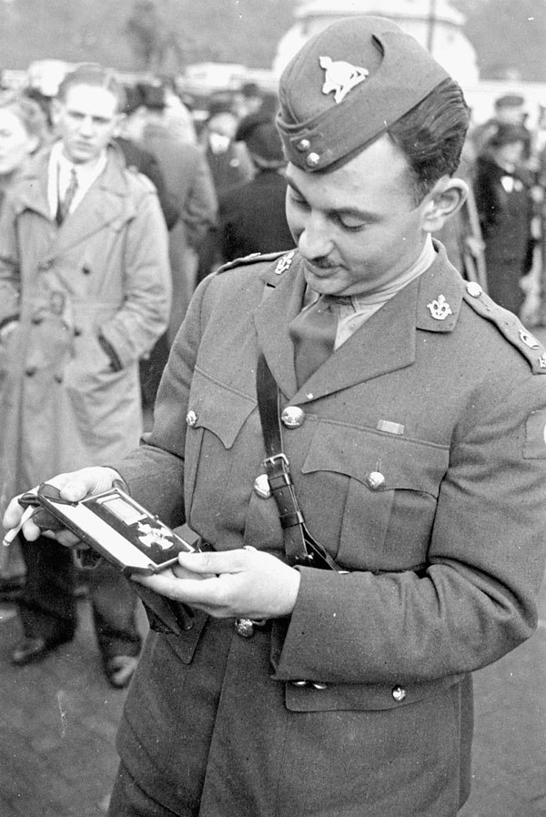 Major Marie-Edmond Paul Garneau, of the Royal 22e Régiment, with the DSO he received for "gallant and distinguished services in the combined attack on
