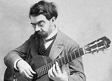 Francisco Tàrrega y a suya guitarra.
