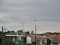 A HM Coastguard helicopter, flying over Newport, Isle of Wight in July 2011. It was landing in Seaclose Park.