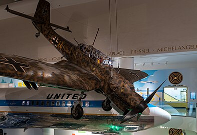 Junkers Ju 87 5954 fighter with the N7017U aircraft in the background, Museum of Science and Industry, Chicago, Illinois, US