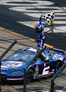 Busch celebrating after winning the 2006 Food City 500. KurtBuschBristol2006.jpg