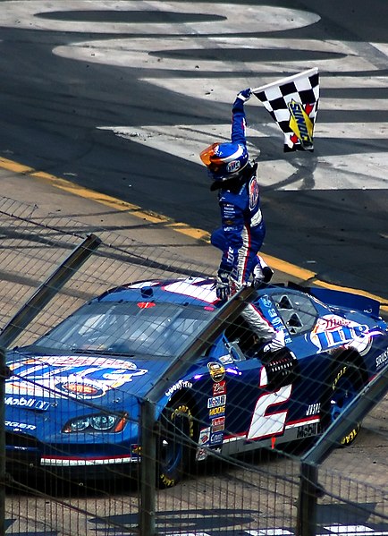 Busch celebrating after winning the 2006 Food City 500.