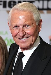 Lute Olson in 2017. Olson had an overall record of 589-187 at Arizona, the 2nd most wins by a coach in Pac-10/12 history Lute Olson by Gage Skidmore.jpg