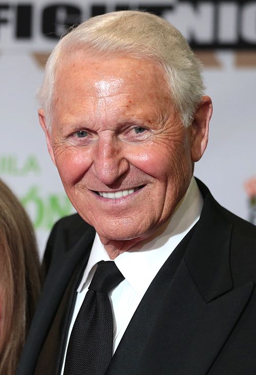 Lute Olson was named Coach of the Year a record seven times with Arizona