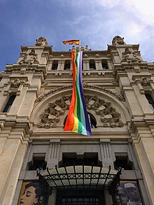 Facade of Madrid City Hall with the rainbow flag during Madrid Pride (2015). Madrid Pride Orgullo 2015 58865 (19573209485).jpg
