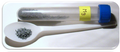 Magnesium sample in a test tube and in a plastic spoon.png