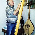 Master of Georgian folk instruments Nukri Kelaptrishvili with his Instruments