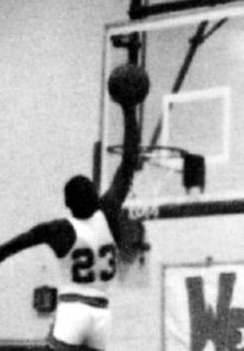 Jordan going in for a slam dunk for the Laney High School varsity basketball team, c. 1979–80