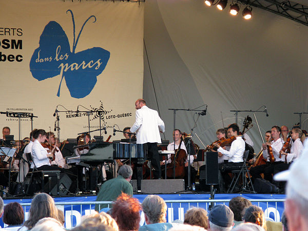 Outdoor concert of the Montreal Symphony Orchestra with conductor Jean-François Rivest in the borough of Pierrefonds-Roxboro in August 2008.