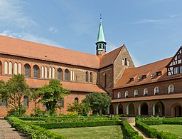 Cloister garden courtyard and St. Marien church (rear) of the Kloster Lehnin (Lehnin abbey, a German Brick Gothic era monastery near Brandenburg/Havel...