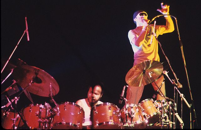 Chester Thompson and Collins on the album's 1981 tour, performing "Who Dunnit?"