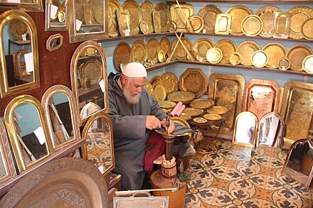 Plate maker in medina of Marrakech