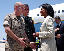 United States Secretary of State Condoleezza Rice speaks with United States Marine Corps Brig. Gen. Carl Jensen in Larnaca, Cyprus Rice speaks with troops after landing in Larnaca July 24 2006.jpg