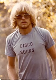 A man wearing a "disco sucks" T-shirt. Rich Carey, 1977.jpg