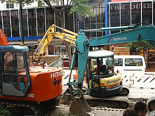 Road Work in New Zealand By Hamish MacEwan from Wellington, New Zealand (Flickr) [CC-BY-2.0 (https://creativecommons.org/licenses/by/2.0)], via Wikimedia Commons