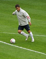 Robbie Williams warming up for the 2006 edition of Soccer Aid Robbie Williams SoccerAid2006 Pre-Match Training.jpg