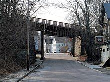 Southern New England Trunkline Trail bridge over Canal Street, one of four railroad bridges in the district SNETT bridge over Canal Street, February 2016.JPG