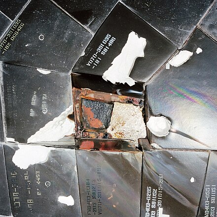 Melted aluminum plating on Atlantis's right wing underside (STS-27).