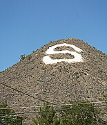 Sunnyslope Mountain, a.k.a. "S" Mountain. In December 1954, various students from Sunnyslope High School painted an "S" on the mountain which now is in the Phoenix Historic Property Register. It is located near Central Avenue and Hatcher Street.