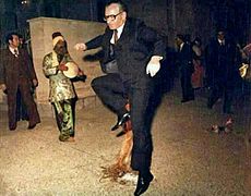 Mohammad Reza Pahlavi, the last Shah of Iran, jumping over the fire.