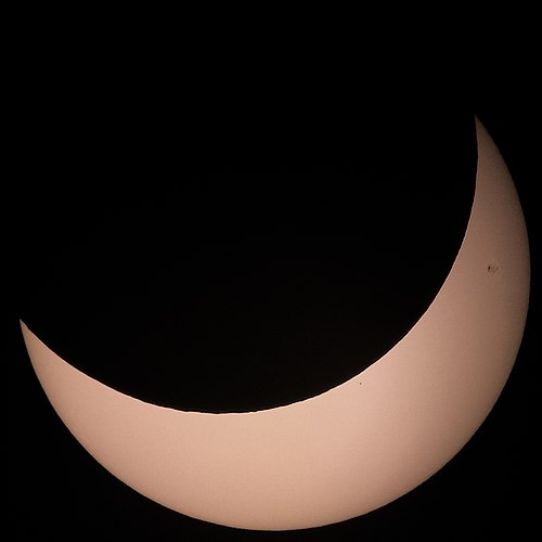 During a partial solar eclipse, the Moon blocks only part of the Sun's disk (October 25, 2022).