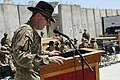 U.S. Army Lt. Col. William Johnson, at lectern, the commander of the 5th Battalion, 82nd Field Artillery Regiment, 4th Brigade Combat Team, 1st Cavalry Division, gives a speech during a change of command 130518-A-XM609-123.jpg