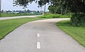 Westbound as the trail curves away from the Orange Belt alignment, which is in use ahead by the Florida Central.