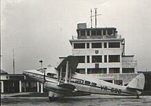 Governor Murchison, a de Havilland Express during its 1938 delivery flight, marking a pivotal moment in the airline's fleet expansion Wearne's Air VR-SBD.jpg