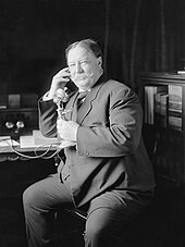 One of a series of candid photographs known as the Evolution of a Smile, taken just after a formal portrait session, as Taft learns by telephone from Roosevelt of his nomination for president. Wm H Taft smiling 1908.jpg