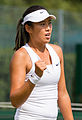 Yang Zhaoxuan competing in the second round of the 2015 Wimbledon Qualifying Tournament at the Bank of England Sports Grounds in Roehampton, England. The winners of three rounds of competition qualify for the main draw of Wimbledon the following week.