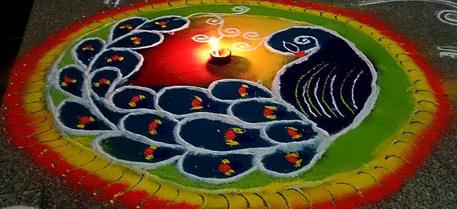 Colorful floor patterns to mark Vijayadashami.